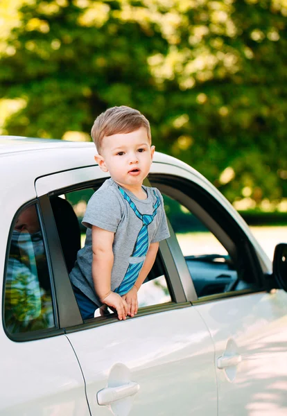 Adorable baby boy in the car — Stock Photo, Image