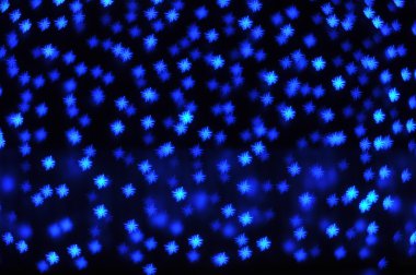 Arka plan mavi yıldızların ışıkları ile