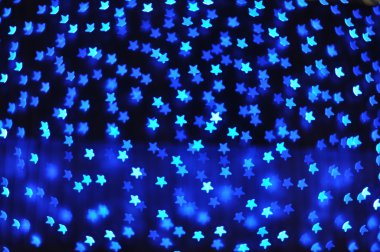 Arka plan mavi yıldızların ışıkları ile