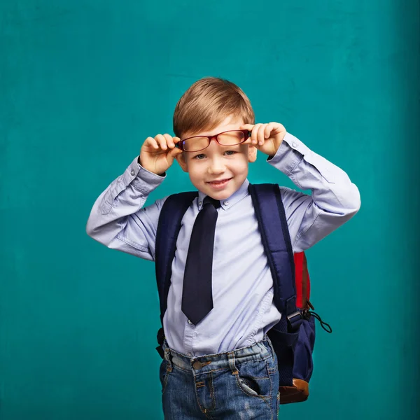 Little Boy in eyeglasses with big backpack — Stock Photo, Image