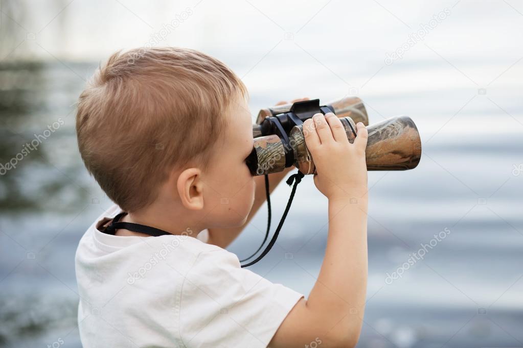 Child with cheap binoculars