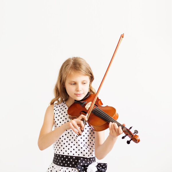 Portrait of girl with string and playing violin.