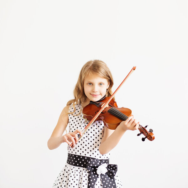 Portrait of girl with string and playing violin