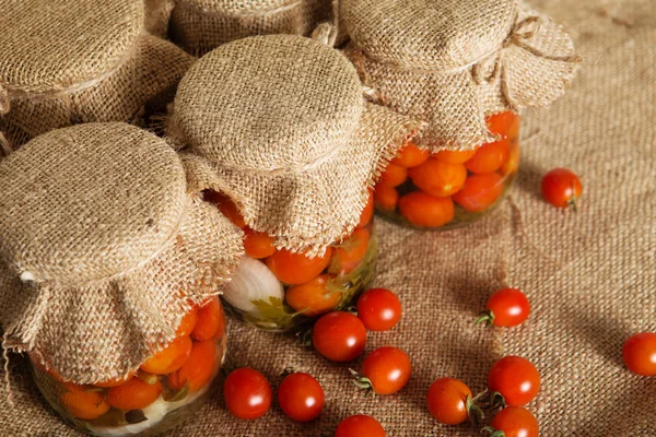 Home canning. Banks pickled tomatoes