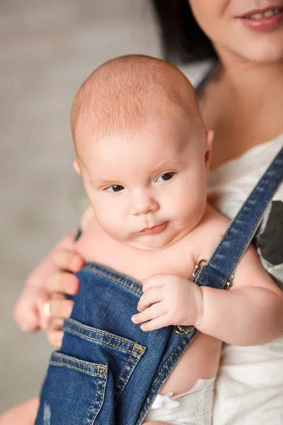 Portrait of a baby sitting in my mother's suit — Stock Photo, Image