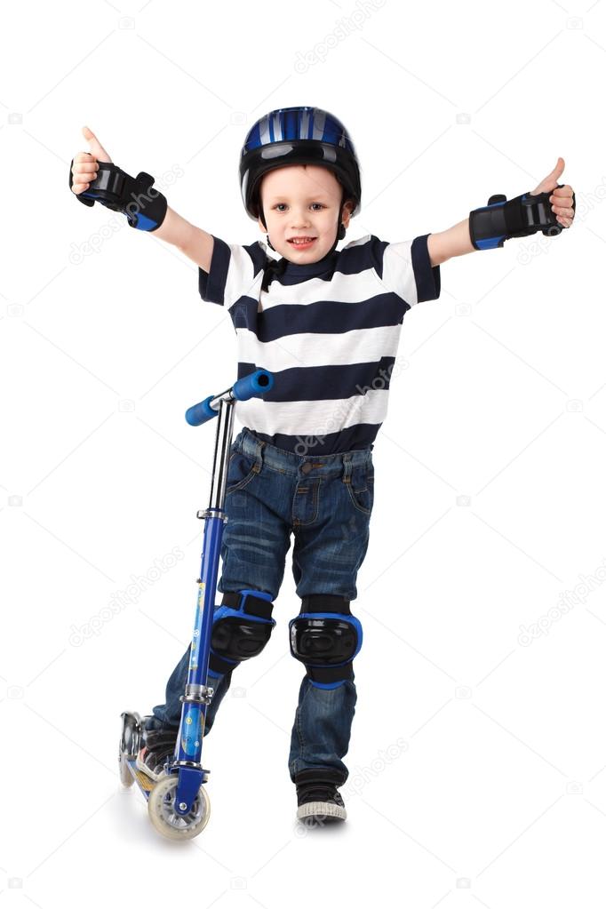 Little boy in protection helmet and in the knee and arm ruffles 