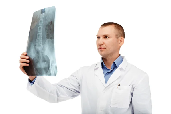 Portrait of a young male doctor in a white coat — Stock Photo, Image