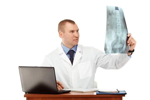 Portrait of a young male doctor in a white coat — Stock Photo, Image