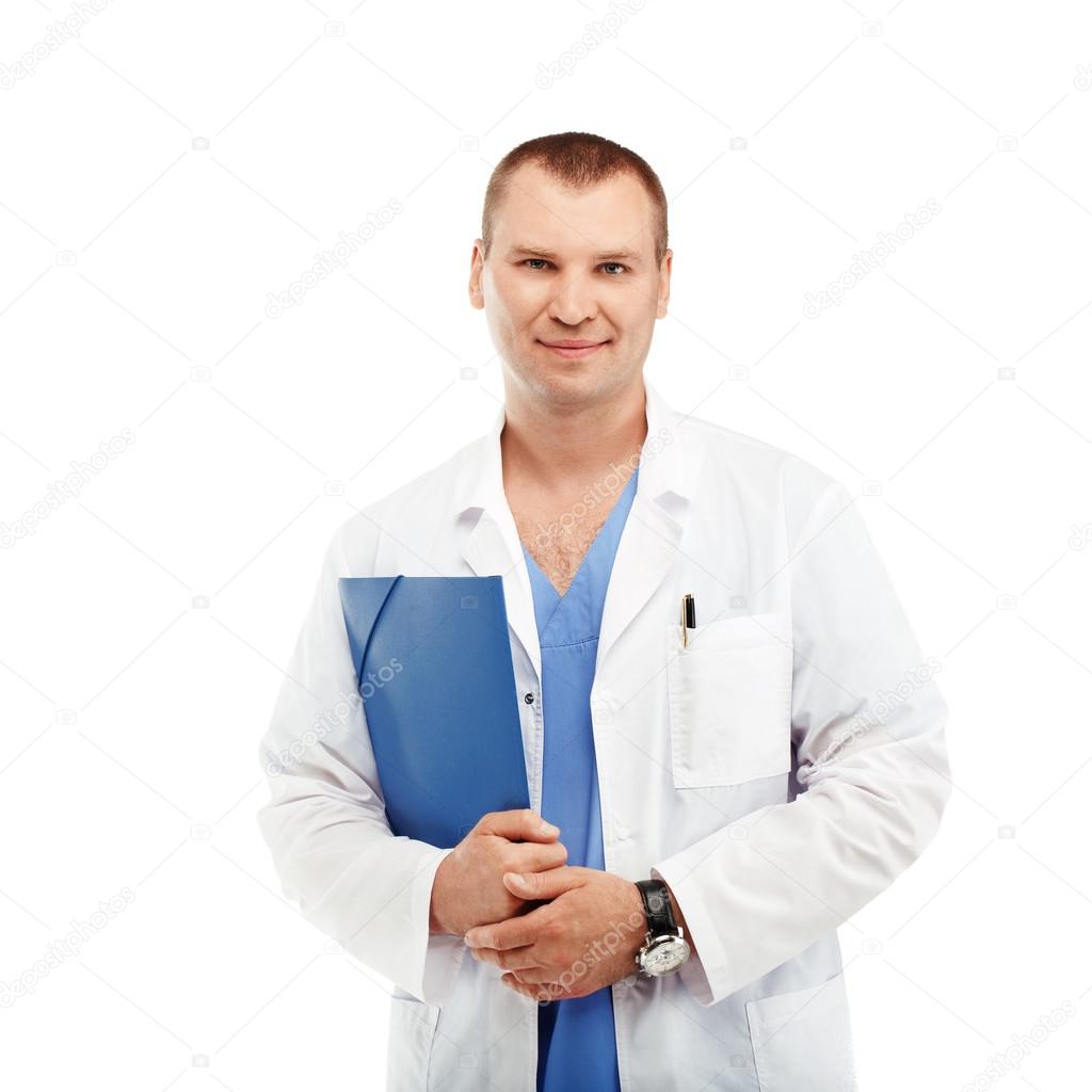 Portrait of a young male doctor in a white coat and blue scrubs 