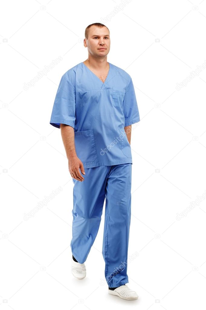 Full length portrait of a young male doctor in a medical surgica