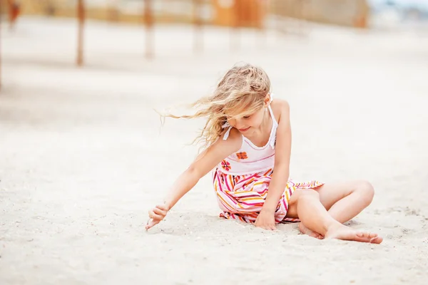 Portrait of a pretty little girl with waving in the wind long ha — Stock Photo, Image