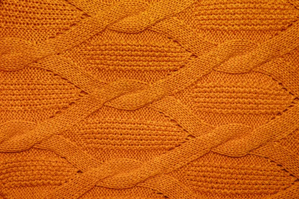 Közelről narancs gyapjú pulóver textúra — Stock Fotó