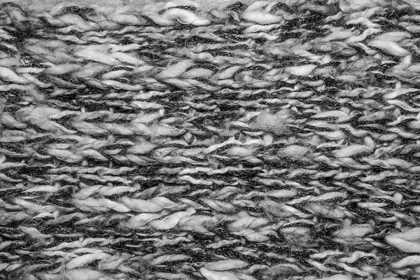 Szürke melange bolyhos szövött szál pulóver, vagy sálat, mint a háttere — Stock Fotó