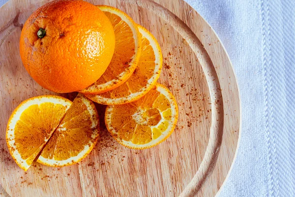 Orange with cinnamon — Stock Photo, Image