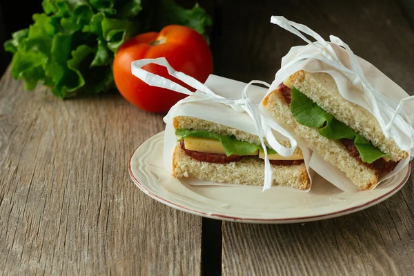 Sandwiches with salami — Stock Photo, Image