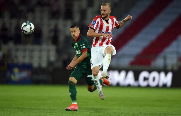 CRACOV, POLAND - AUGust 01, 2021: Polonya Futbol Ligi oyunu Krakovia Krakow - Slask Wroclaw, Robert Pich (Slask Wroclaw) Michal Siplak (Cracovia) 