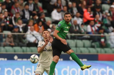 WARsaw, POLAND - SEPTEMBER 19, 2021: Legia Warszawa - Gornik Leczna, Bartosz Slisz (Legia Warszawa) Bartosz Spiaczka (Gornik Leczna)) 
