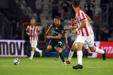 CRACOV, POLAND - Polonya Futbol Ligi maçı Krakovia Krakow - Slask Wroclaw, Szymon Lewkot (Slask Wroclaw) Florian Loshaj (Krakovia)) 