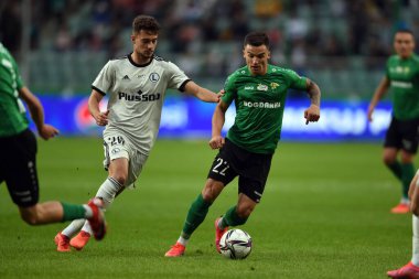 WARsaw, POLAND - SEPTEMBER 19, 2021: Legia Warszawa - Gornik Leczna, Ernest Muci (Legia Warszawa) Serhii Krykun (Gornik Leczna) 