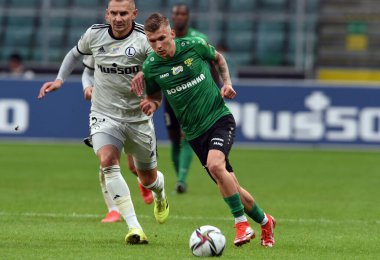 WARsaw, POLAND - SEPTEMBER 19, 2021: Polonya Futbol Ligi oyunu Legia Warszawa - Gornik Leczna, Artur Jedrzejczyk (Legia Warszawa) Damian Gaska (Gornik Leczna) 