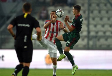 CRACOV, POLAND - AUGust 01, 2021: Polonya Futbol Ligi oyunu Krakovia Krakow - Slask Wroclaw, Matej Rodin (Cracovia) Fabian Piasecki (Slask Wroclaw) 