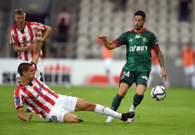 CRACOV, POLAND - AUGust 01, 2021: Polonya Futbol Ligi oyunu Krakovia Krakow - Slask Wroclaw, Matej Rodin (Krakovia) Caye Quintana (Slask Wroclaw) 