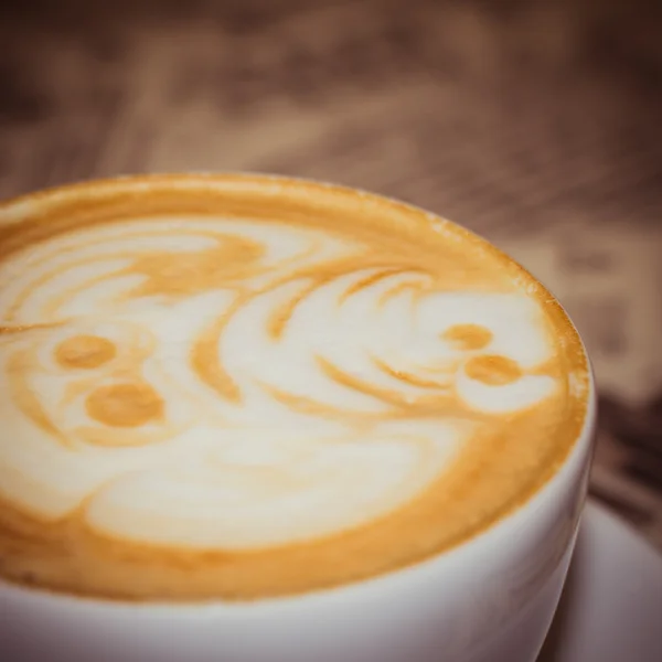 A cap of a funny decorated cappuccino — Stock Photo, Image