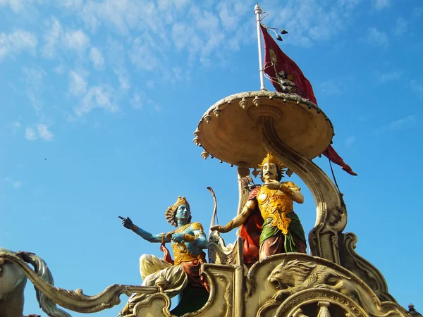 Ο Λόρδος Krishna κήρυγμα Bhagavadgita να Arjuna στο πεδίο της μάχης σε Kurukshetra Εικόνα Αρχείου