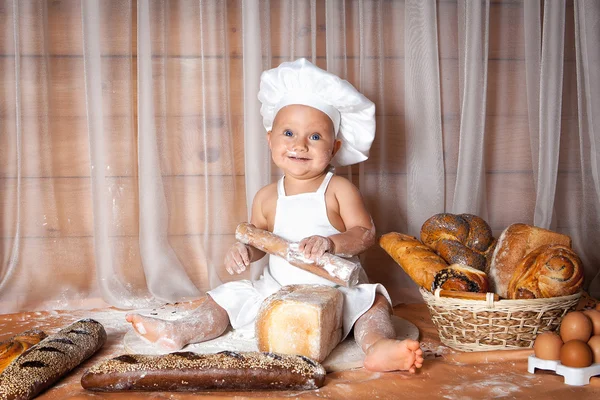 幸せな赤ちゃんのパン屋の横 ロイヤリティフリーのストック画像