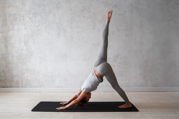 Premium Photo  Woman practicing advanced yoga on organic mat series of yoga  poses tropical background