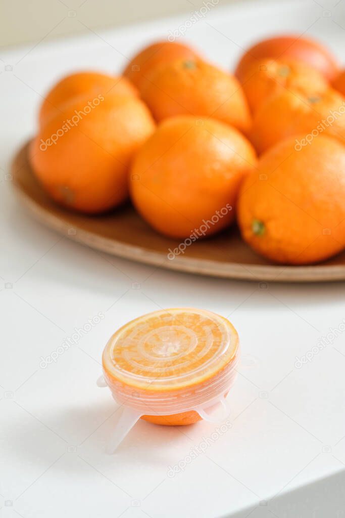 How to use as directed universal silicone lids for kitchen. The orange cut in half will have a long shelf life. Eco-friendly kitchen products. Zero waste and sustainable plastic free lifestyle.