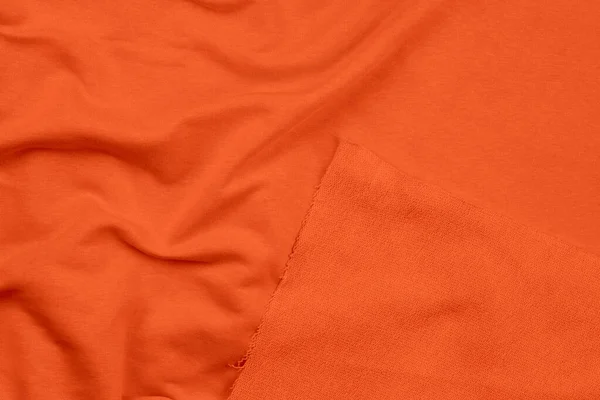 Pozadí z oranžové monochromní bavlněné tkaniny. Zavřít texturu — Stock fotografie