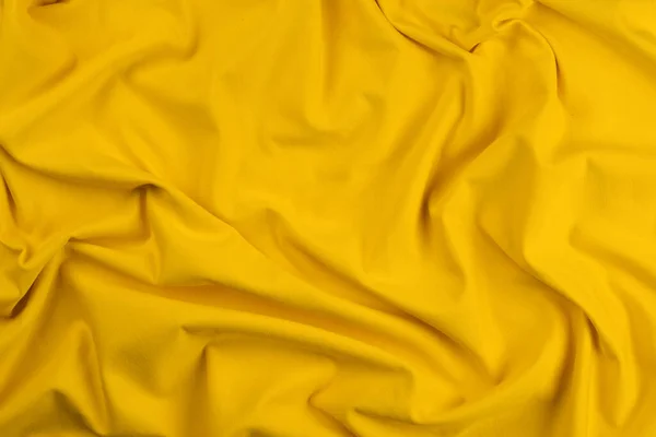 背景为黄色单色棉织物.闭合纹理 — 图库照片