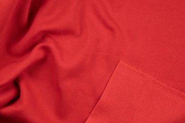 Kırmızı monokrom pamuk kumaşının arka planı. Dokuyu kapat