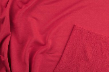 Kırmızı monokrom pamuk kumaşının arka planı. Dokuyu kapat