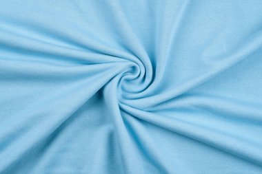 Açık mavi tek renkli pamuk kumaşının arkaplanı.