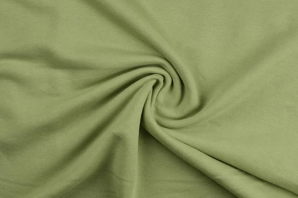 Pozadí ze zelené monochromatické bavlněné tkaniny. Zavřít texturu — Stock fotografie