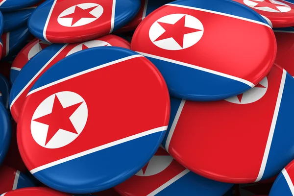 Hromadu severokorejská vlajka odznaky - vlajka Severní Korea tlačítka navršených — Stock fotografie