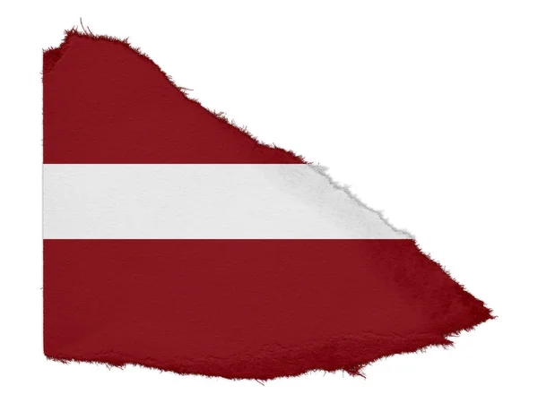Flagge von Lettland zerrissenen Papierschrott isoliert auf weißem Hintergrund — Stockfoto