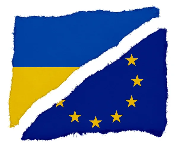 Ukrajinské a vlajka Eu roztrhané zbytky papíru izolovaných na bílém pozadí — Stock fotografie