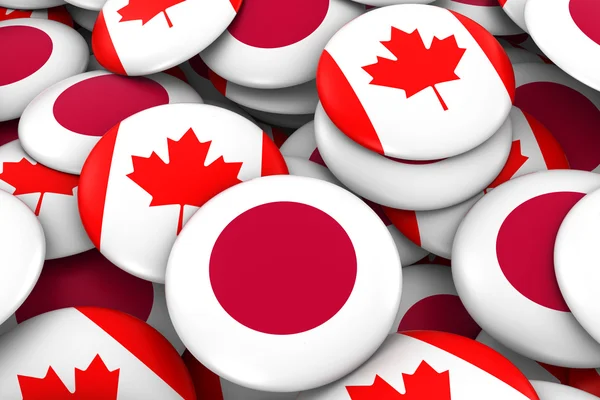 Fundo de emblemas do Japão e do Canadá - Pilha de botões de bandeira japoneses e canadenses ilustração 3D — Fotografia de Stock