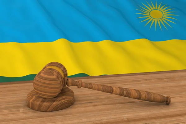 Концепция руандийского права - флаг Руанды за молотком судьи 3D иллюстрация — стоковое фото