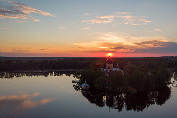 Sunset over the lake. Vvedenskoe lake. Vvedensky Monastery. Pokrov. Vladimir region. Russia