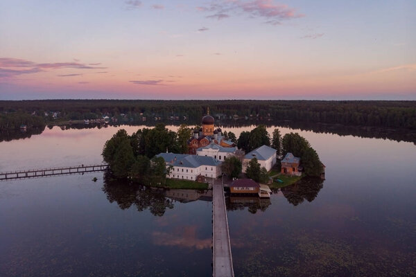 Sunset over the lake. Vvedenskoe lake. Vvedensky Monastery. Pokrov. Vladimir region. Russia