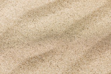 Arkaplan için kum yüzeyinin yakın çekim görüntüsü