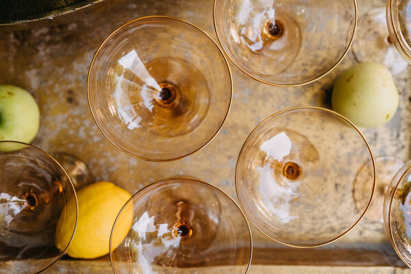 top view of glasses and fruits on vintage rusty metal tray
