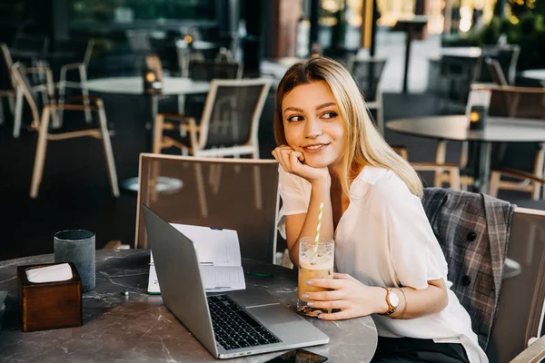 beautiful young businesswoman working in restaurant