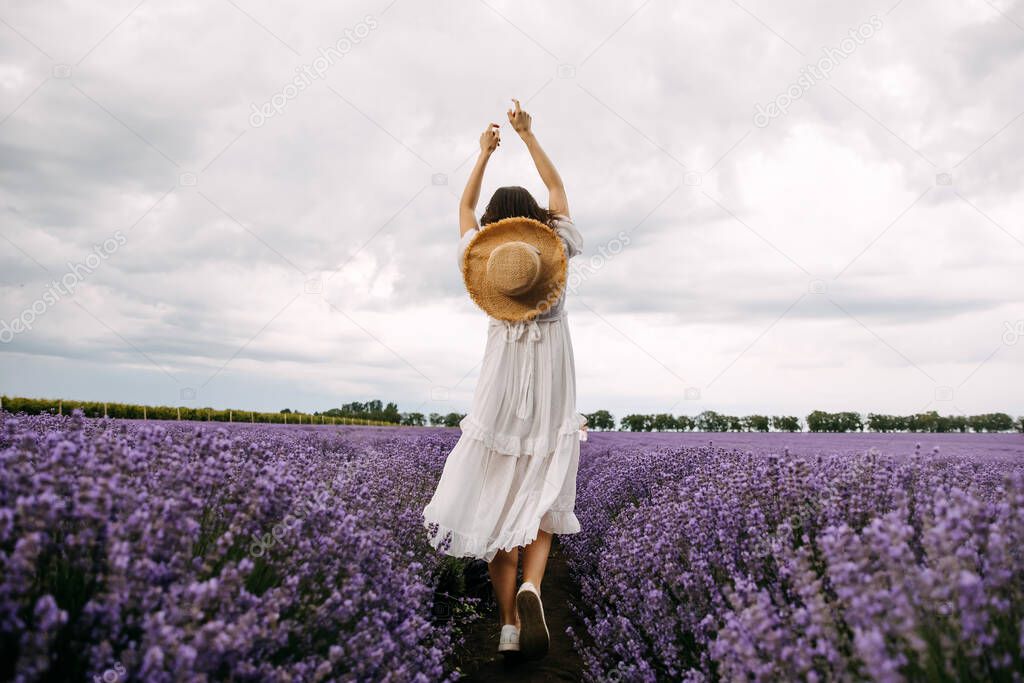 portrait of beautiful woman in lavender field