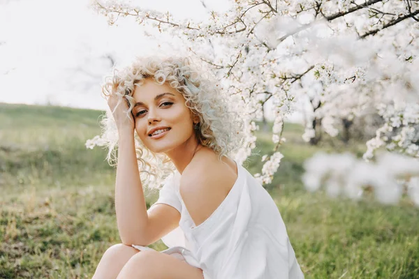 Young Blonde Woman Curly Hair Wearing White Dress Sitting Cherry — Foto de Stock