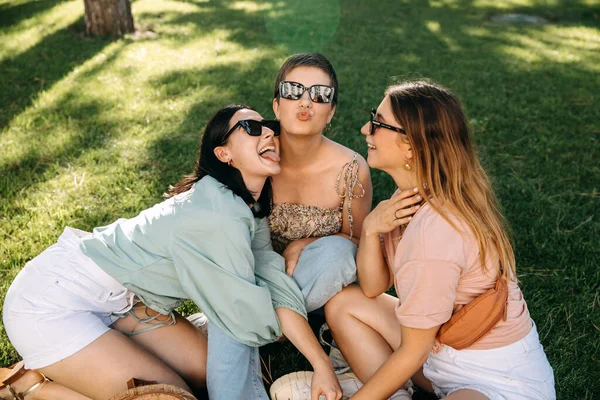 Group Young Women Outdoors Having Good Time Sitting Green Grass — Stockfoto